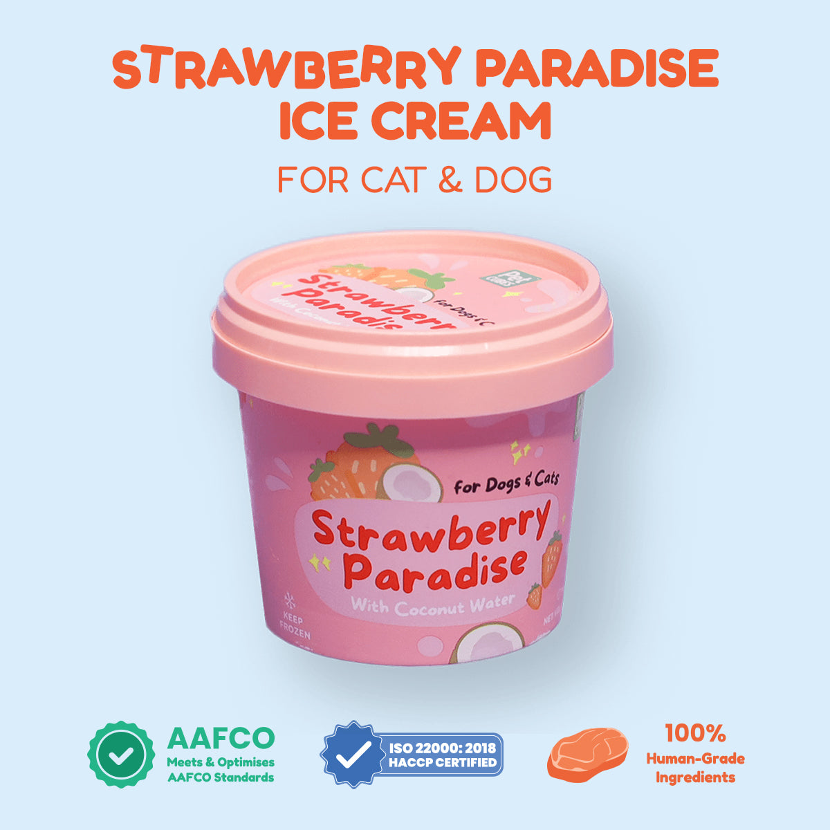 A pink tub of Strawberry Paradise PetCubes ice cream for cats and dogs, shown on a light blue background with certifications like AAFCO, human-grade and ISO HACP 